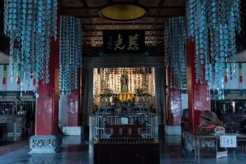 Inside the temple. Notice the pendulum string hanging from the hole in the roof.