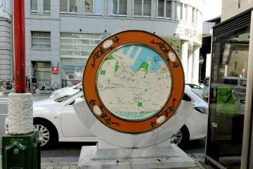 Circular area map embellished with peony flowers