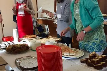 Very busy cutting cakes!