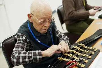 Men working on their Samurai armor