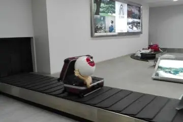 Kitaro's Father Medama-oyaji at Airport
