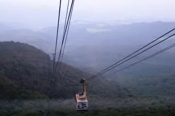 A ropeway car makes its way down the Hakkoda mountains