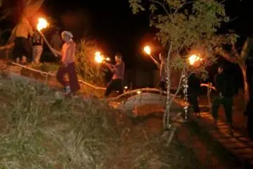 A procession of fire during a festival (Photo: Yuki Takata)