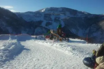 Sledding, tubing and snow play areas at the top and bottom of the resort.