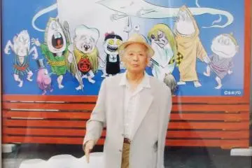 Picture of Shigeru Mizuki at the local Fish Market