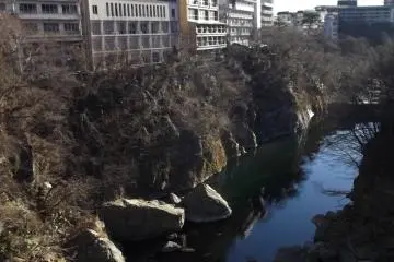 The riverside is lined with onsen hotels