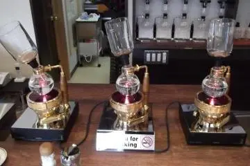 <p>Hubble, bubble, toil and trouble: Coffee siphons on the counter</p>