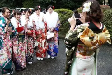 There were people taking photos of each other and their friends.