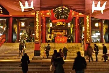 Many people visit the temple, even at night