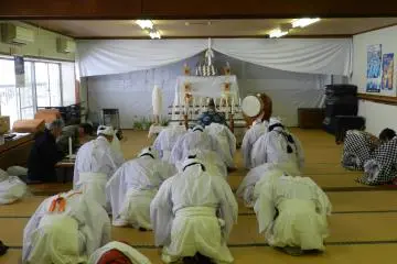 Priests and monks make offerings before the Sange Sange festival