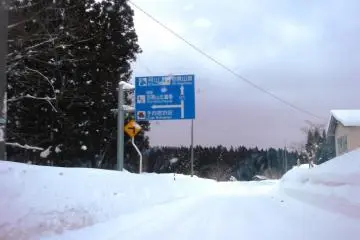 Driving to Mount Haguro in winter is tough; better take the local bus from Tsuruoka Station