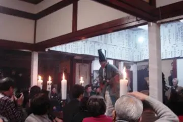 The next player comes on stage, announcing the start of another Noh piece