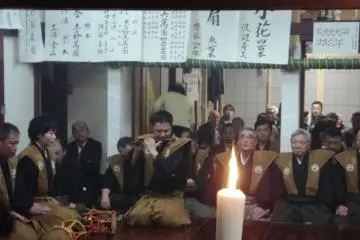 The flute player is an essential member of the group of instrumentalists in any Noh performance