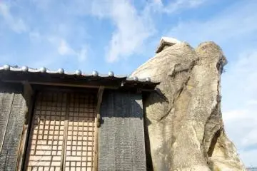 The simple shrine building is like a work of art itself.