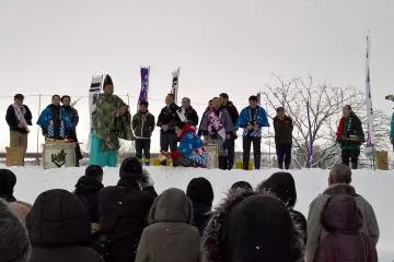 A shinto priest blessing the local fire fighters