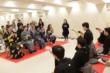 Making a toast (tea or sake)