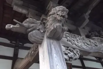 Some of the detailed carvings under the eaves of the hall