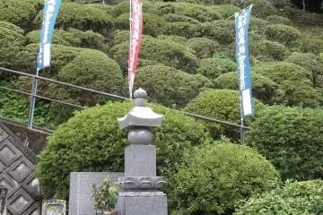 The statue is up at the top of this hill