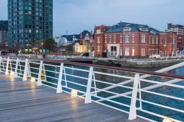 View of the Customs House and Highmart tower from the Blue Wing Moji pedestrian drawbridge