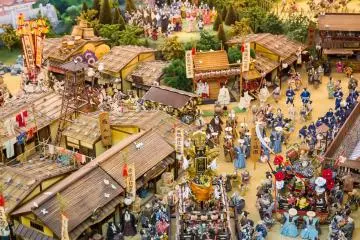 Panorama of the castle in its heyday with 1500 paper dolls in the castle's museum