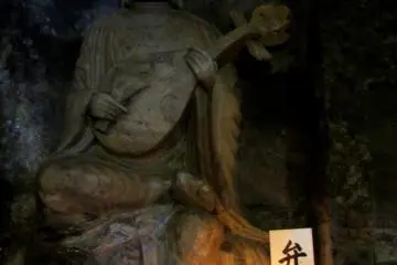 Statues in Benten-kutsu Cave