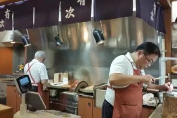 Engraving names on knives, Aritsugu
