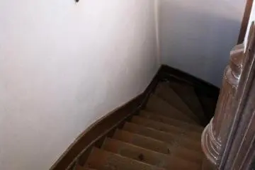 The staircase is twisting and very compact.