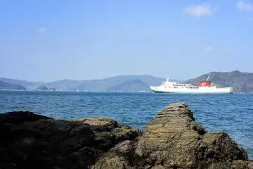 There are several paths down to the sea, and in the warmer weather, you can swim and snorkel here. The ferries to Kyushu pass frequently.