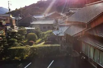 The view of an Edo-period house from the Yokan next door. The projecting porch marks it as the home of a samurai family.