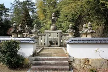 It's a lonely spot, and the combination of the stone structures and bamboo creates a strange atmosphere