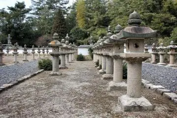 There's something a little oppressive about the serried rows of lanterns, standing like sentinels