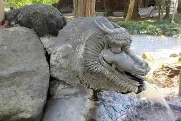 Traditional purifying water in Suwa Taisha is hot as it comes from a hot spring