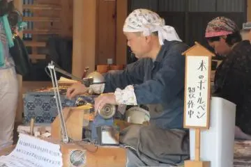 Some craftsmen demonstrate their work