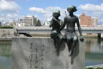 Sculpture of children with a dove of peace