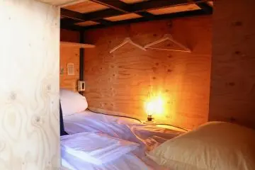 Bed within the shelves