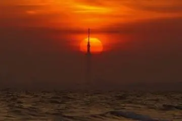 To get this view on a camera, zoom in on the city skyline. I spotted Tokyo Skytree in the distance