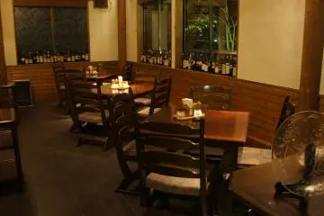 The restaurant interior in the evening, with a European ambience
