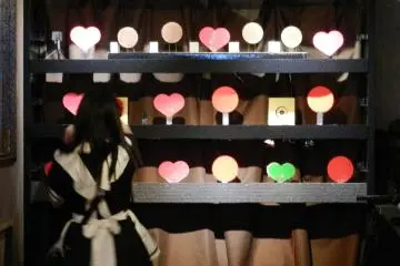 A maid resetting the targets