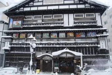 Many ryokan at Ginzan Onsen are decorated with elaborate plaster work