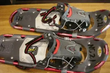 A pair of snowshoes are provided