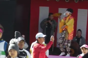 Masked dancers entertain the crowds
