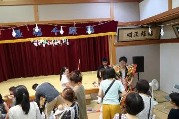 After the performance, one can take pictures with the masks and costumes