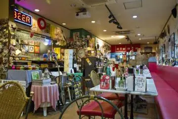The dining room, lined with imports