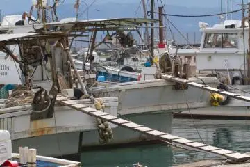 Perahu nelayan cocok untuk menjadi objek foto yang luar biasa