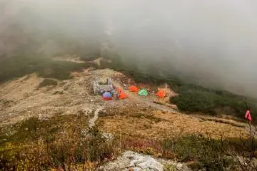  With daylight drawing to an imminent close my only option was to pitch a tent. This was several hours short of my original target