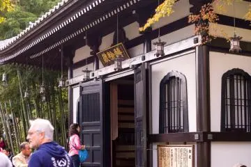The Kyozo, a repository for storing Buddhist scriptures, lies nestled among maple trees and a bamboo grove just past the temple's main halls