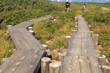 Wooden walkways make this section of the trail easy, but in other places you'll have to scramble over rocks.