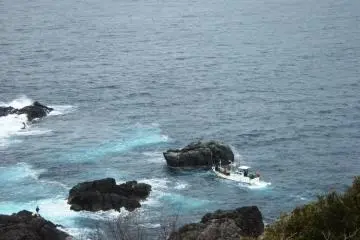 Local fishermen take people out to the rocks to spend a day fishing