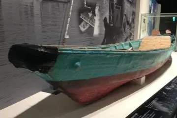 Tatana boat from Okinawa as well as Sabani boats are displayed