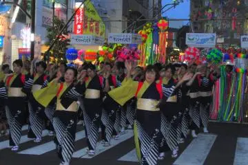  Locals in various yukata designs were dancing on the streets at sundown